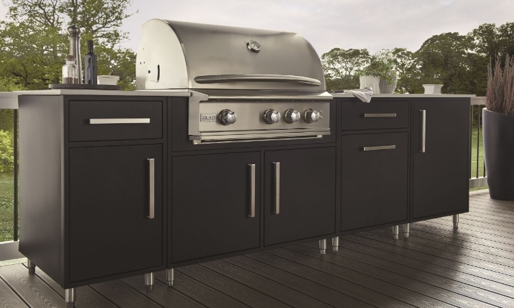 Stylish outdoor kitchen island featuring a stainless steel grill, ample storage, and sleek design for perfect backyard cooking.